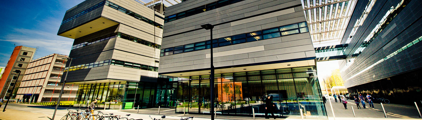 Exterior view of Alan Turing Building on a sunny day